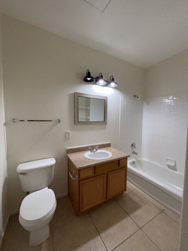 Building Photo - COZY 2 BEDROOM 2 FULL BATH CONDO LOCATED ON SECOND LEVEL
