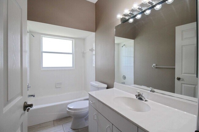 Building Photo - Annual rental: Spacious 3BR/2BA Creekwood Home with Office, Screened Lanai, EV Charger & Resort-S...