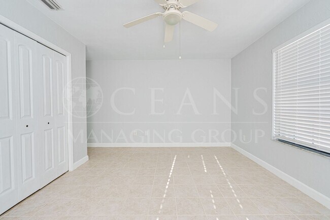 Building Photo - Executive Coastal Retreat | Four-Bedroom P...