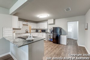 Building Photo - 5027 Blue Bonnet St