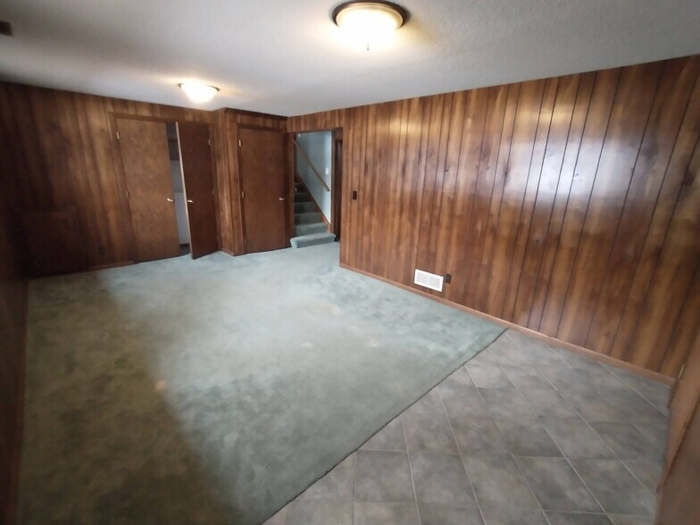 Family room (stairs lead to kitchen) - 2163 Randy Ave