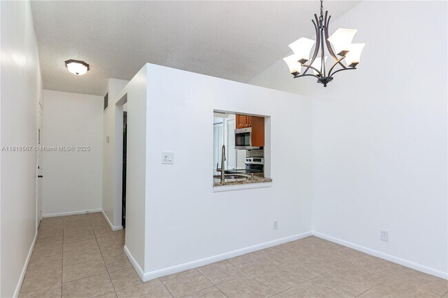 Building Photo - 717 Gardens Dr