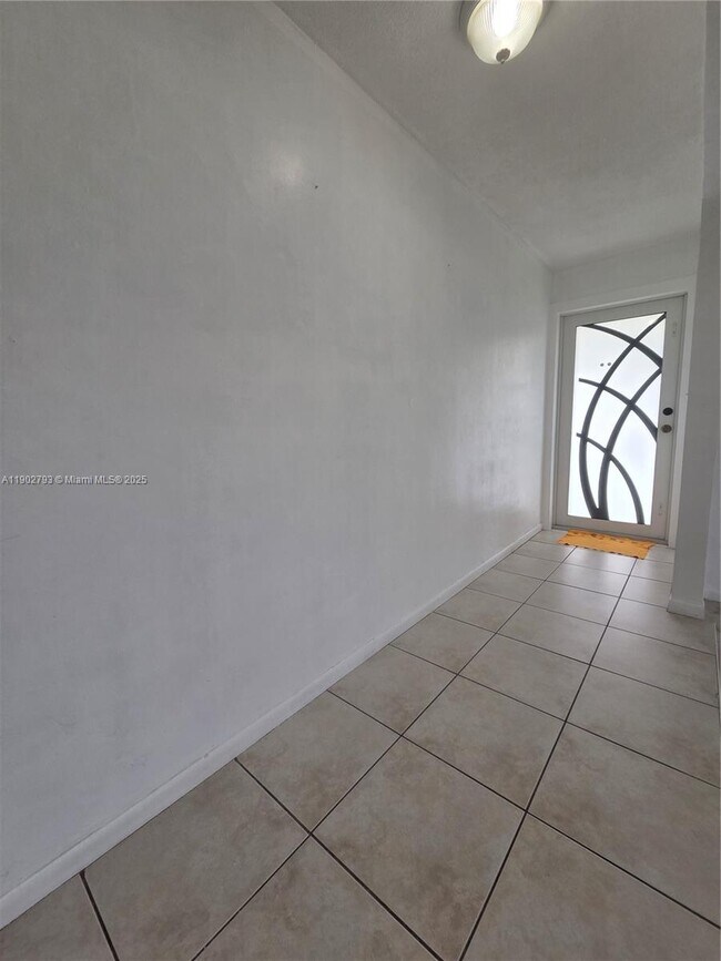 Building Photo - 10725 NW 8th Ave