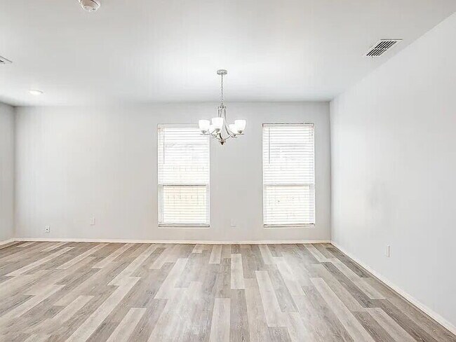 Building Photo - Spacious 3-Bedroom Duplex with Open Living Areas!