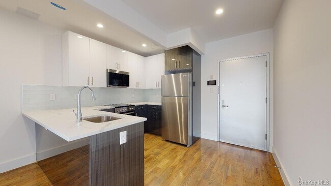 Building Photo - 138-28 Queens Blvd