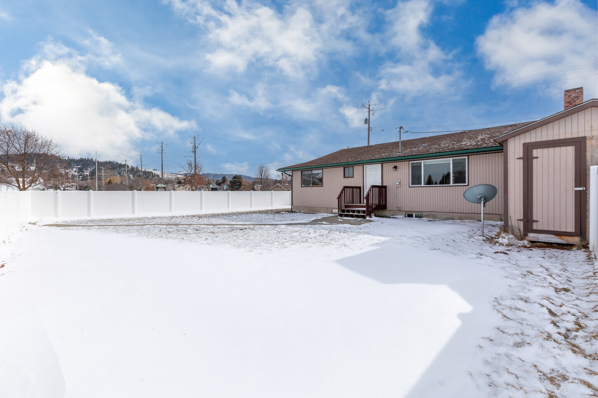 Large, private, fenced backyard - 3507 E 57th Ave