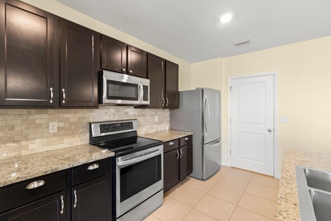 Building Photo - 13911 Smiling Daisy Pl