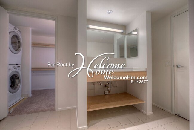 Building Photo - Coming Soon - Downtown High-rise Montage A...
