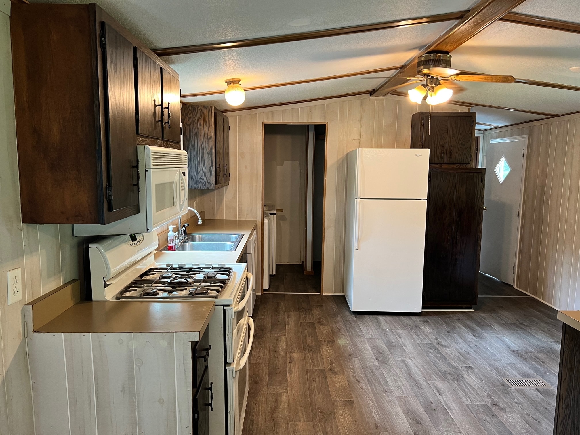 Kitchen with adjacent laundry room - 746 Pony Farm Rd