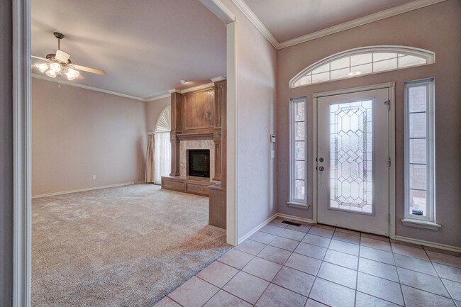 Building Photo - Spacious 4-Bedroom Home with Fireplace, Is...