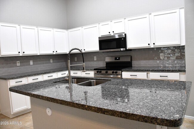 Building Photo - 8787 W Gardenia Ave