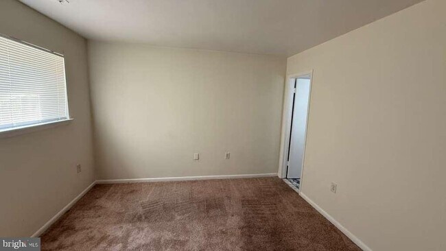 Building Photo - 8103 Greenspring Way