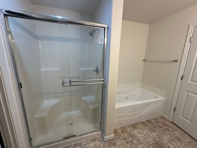 Building Photo - MOVE IN SPECIAL! Spacious 2 bed/2.5 bath with bonus room townhome off Road 68