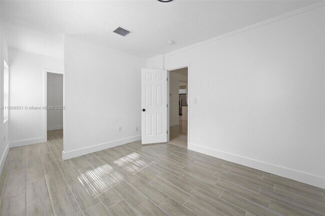 Building Photo - 9312 NW 3rd Ave