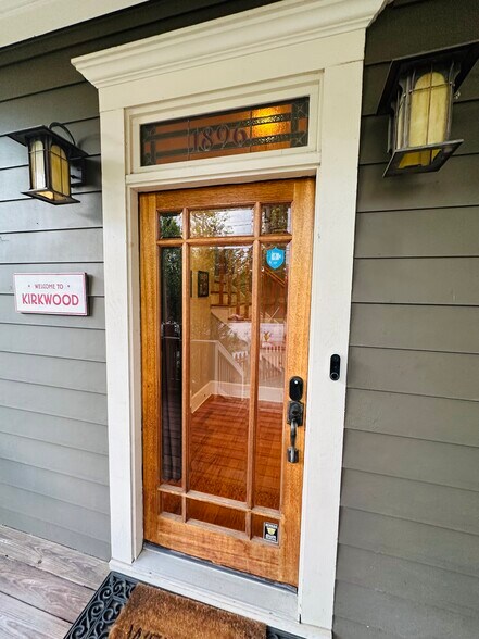 Natural finish Front Door with smartlock and nestcam doorbell - 1896 Hosea L Williams Dr NE