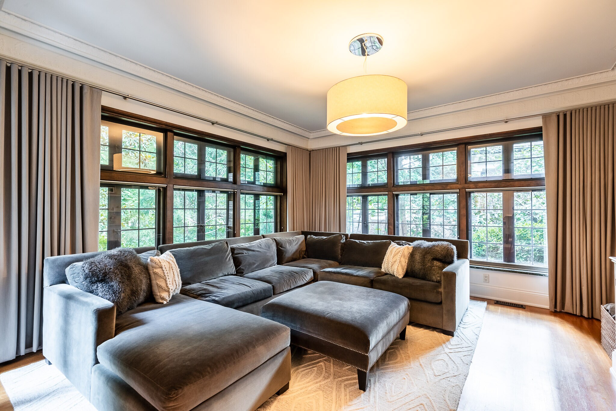 Den includes shades for TV viewing. - 4061 Beechwood Ave