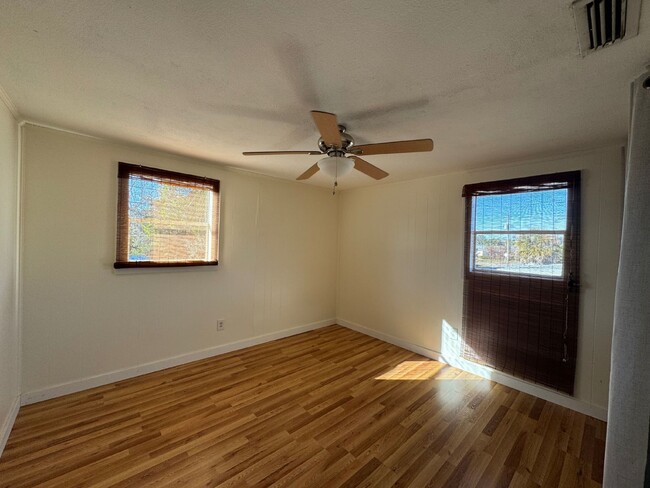 Building Photo - "Charming 2-Bedroom Duplex Oasis on Christ...