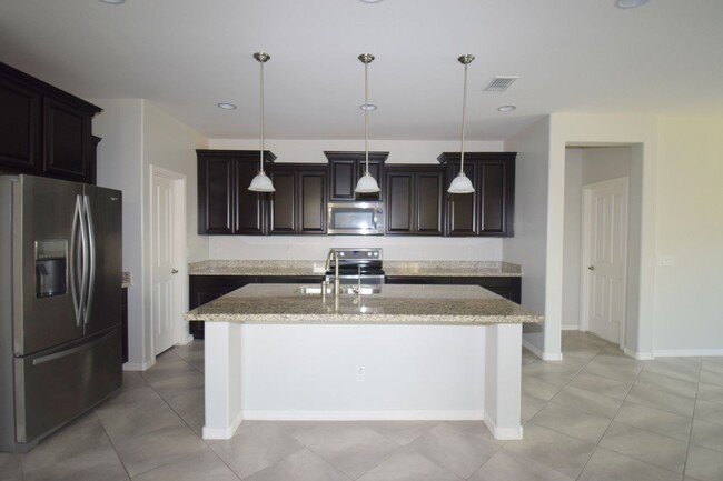 Building Photo - Beautiful single level 4 bedroom 2.5 bath Gilbert home.