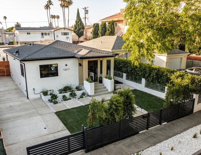 Building Photo - Brand-New Designer Home — 2 Bed + 2 Bath + Office | Gated Yard & Private Driveway Parking