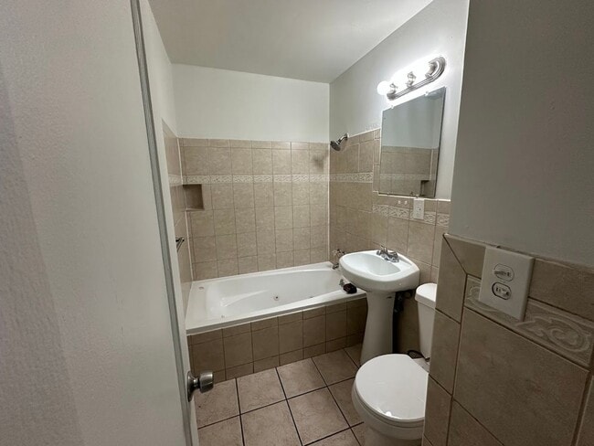 Building Photo - Spacious 4 Bedroom Home | 2 Living Rooms | Large Fenced Yard | 1,700+ Sq Ft