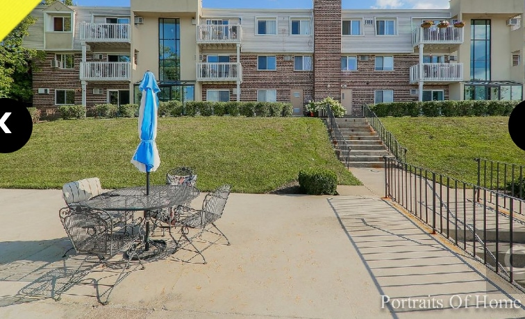 back of unit - patio.deck for your use - 213 E Liberty St