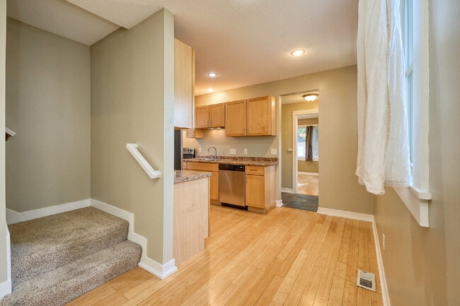 Building Photo - Charming 4-Bedroom Home with Gleaming Hardwood Floors in Vibrant Minneapolis Neighborhood!