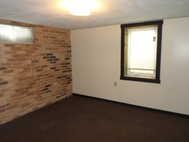 Building Photo - Privacy Fence and a Garage!