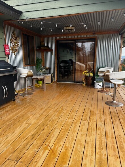 Upper deck from dining area - 12505 S Center Ln