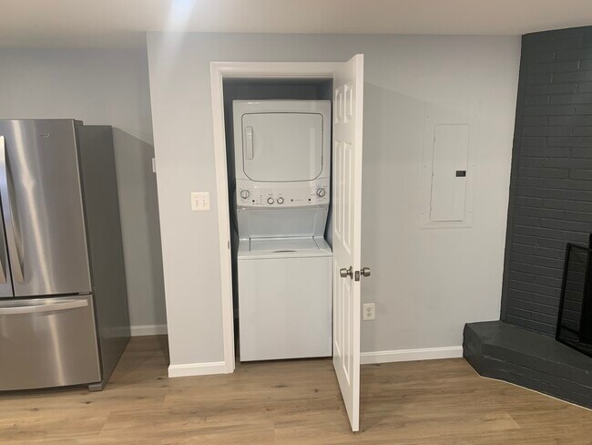Laundry between kitchen and fireplace - 4631 Massachusetts Ave NW