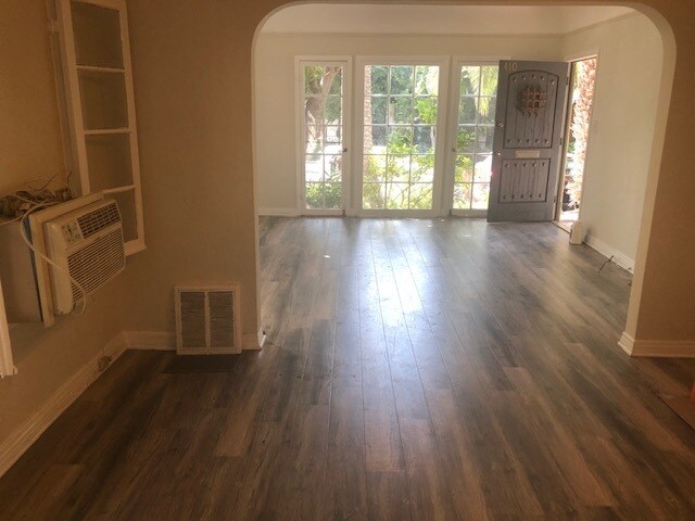 VIEW OF LIVING AND DINING ROOM AND FRENCH WINDOWS - 410 N Orange Grove Ave