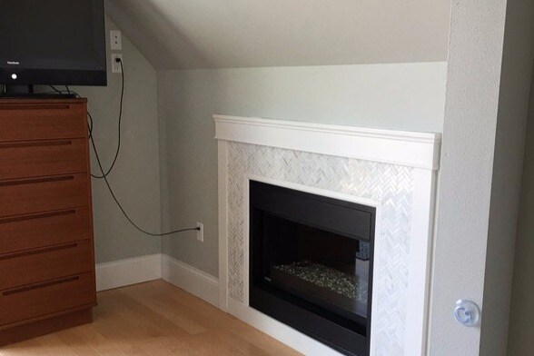 master bedroom fireplace - 2547 S Shore Dr