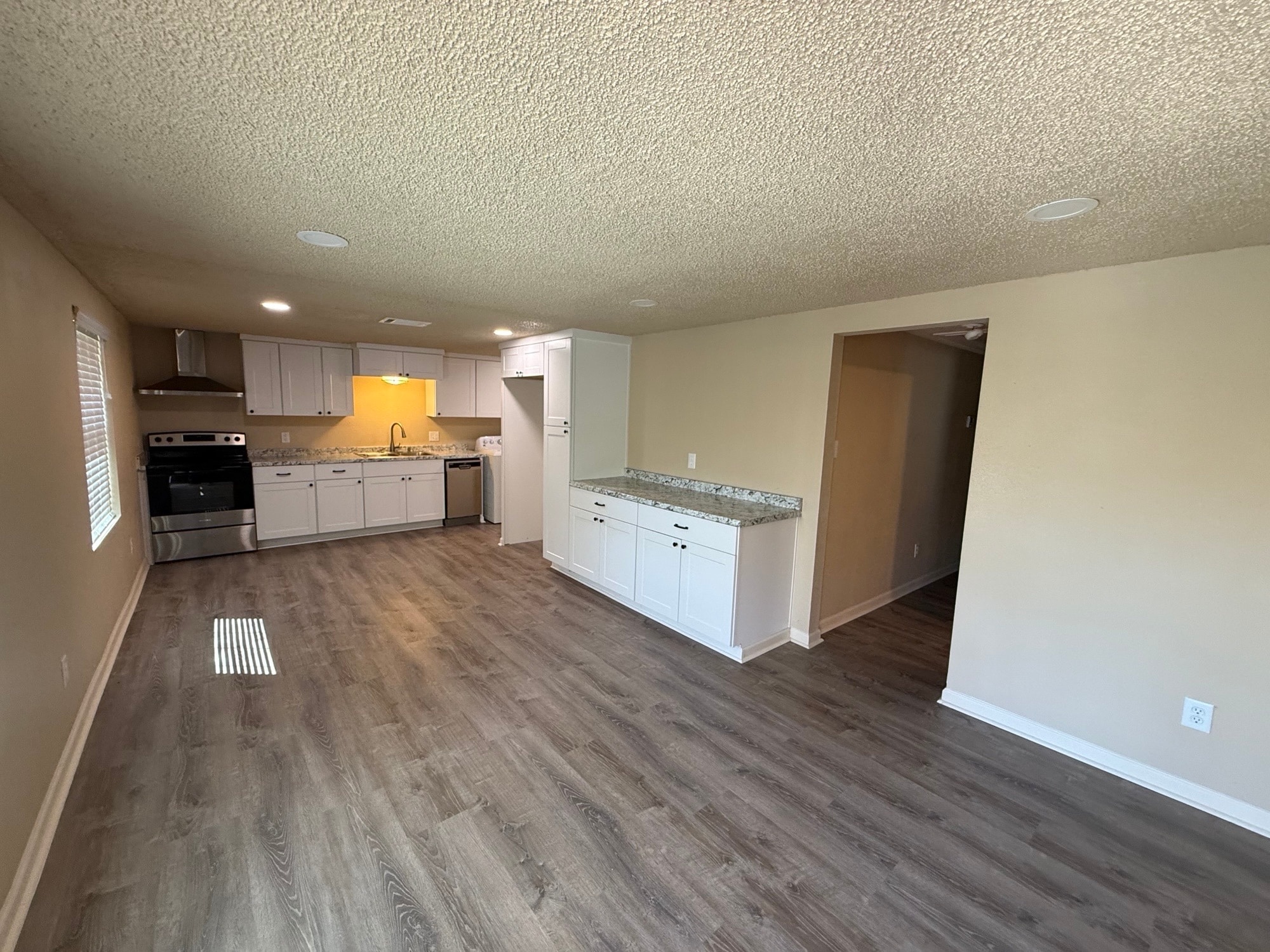 Open Living Area with New Flooring - 760 Wayne Ave