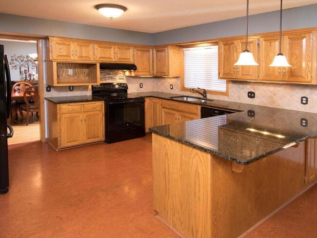 Building Photo - Elegant 2-Story has 4 BRs on Upper Level, Office, 2 Family Rooms, Fireplace & More!