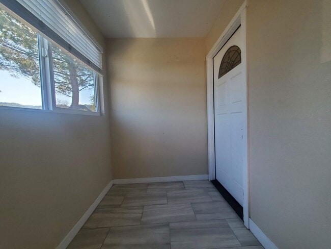 Building Photo - Private 2x2 Santa Rosa Townhouse with pool, 2-car garage, workshop area, fireplace, W/D Hookups