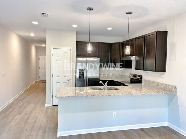 Building Photo - MODEL HOME - SAWYERS PRESERVE - Brand New ...