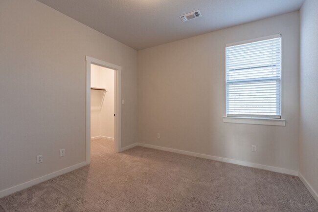 Building Photo - Spacious Buda Beauty Offering Open-Concept Living and Flexible Space for Every Lifestyle!