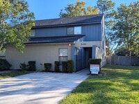 Building Photo - AVAILABLE NOW - Large 2/2 Townhome close t...