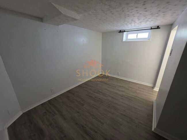 Building Photo - UNIQUE AND COZY 3 BR + BONUS ROOM HOME