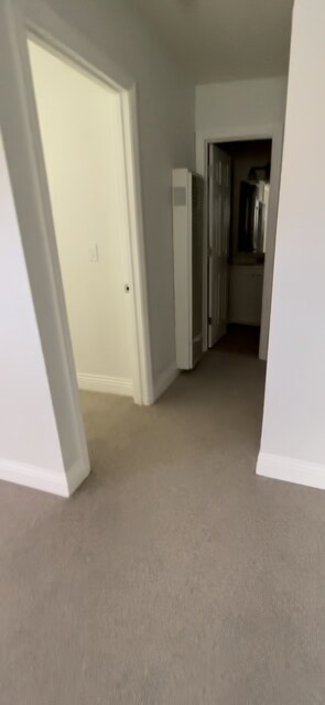 Hallway to bedroom, restroom, and laundry room - 1472 Iris Ave