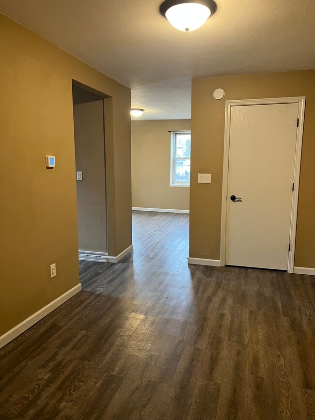 Dining room leads into living room and kitchen - 702 Gertrude St