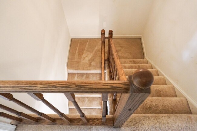 Building Photo - Beautiful brick townhome featuring three f...