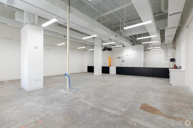 High ceilings and concrete floors - Nine North Euclid