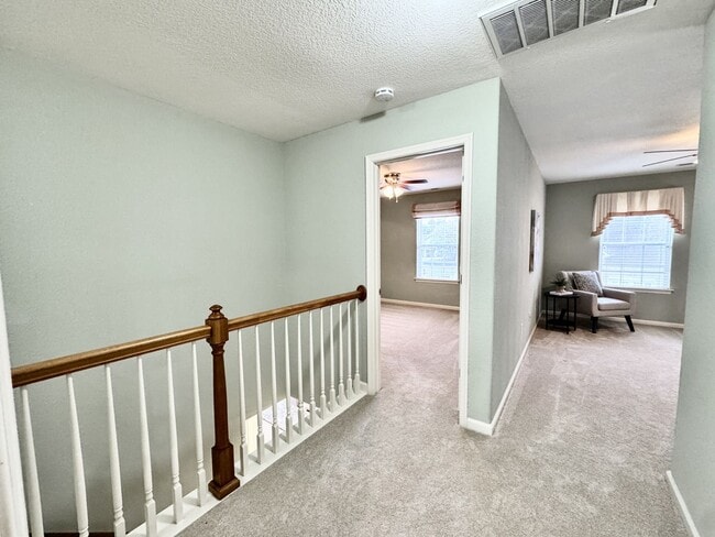 Building Photo - READY NOW!! End-Unit Loft-Style Condo w/1s...