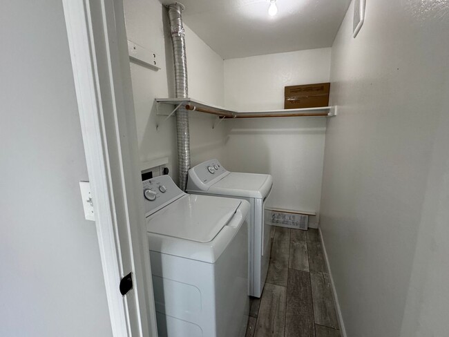 Building Photo - Upstairs 2 bedroom condo with washer and d...