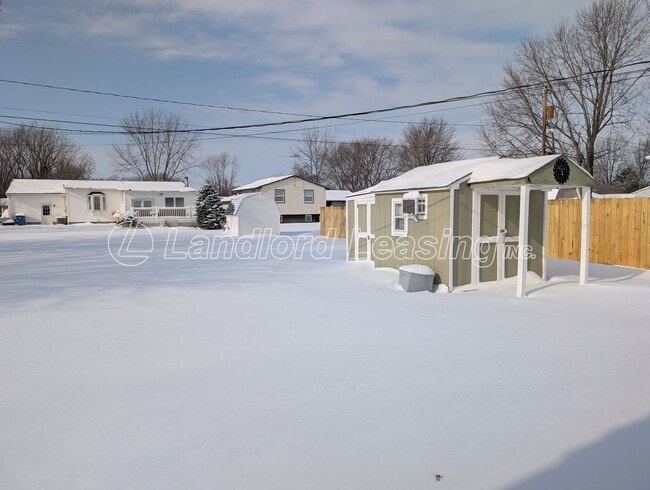 Building Photo - Updated 3-Bedroom Split-Level with Open Kitchen & Finished Lower Level