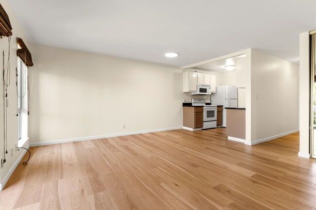 Building Photo - Modern Oakland Living: New Floors, Private Balcony, and Parking