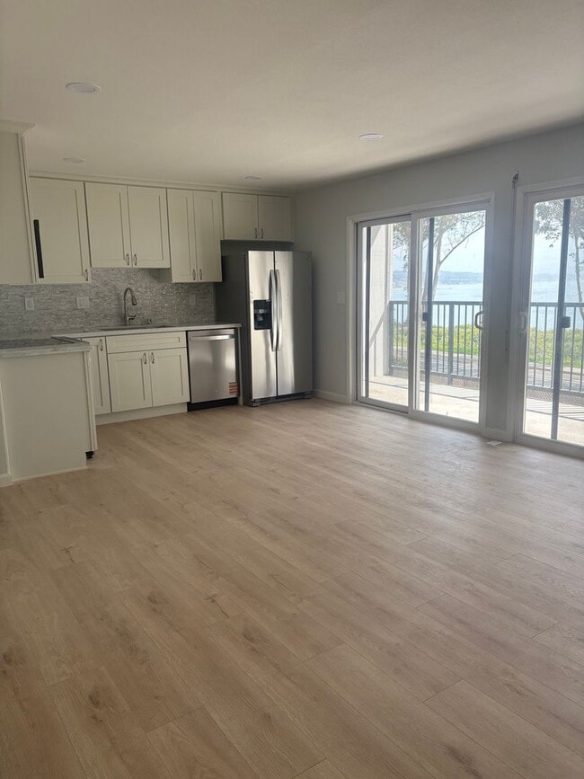 Building Photo - Remodeled Coastal Condo with Panoramic Ocean Views – One Block from New Brighton Beach