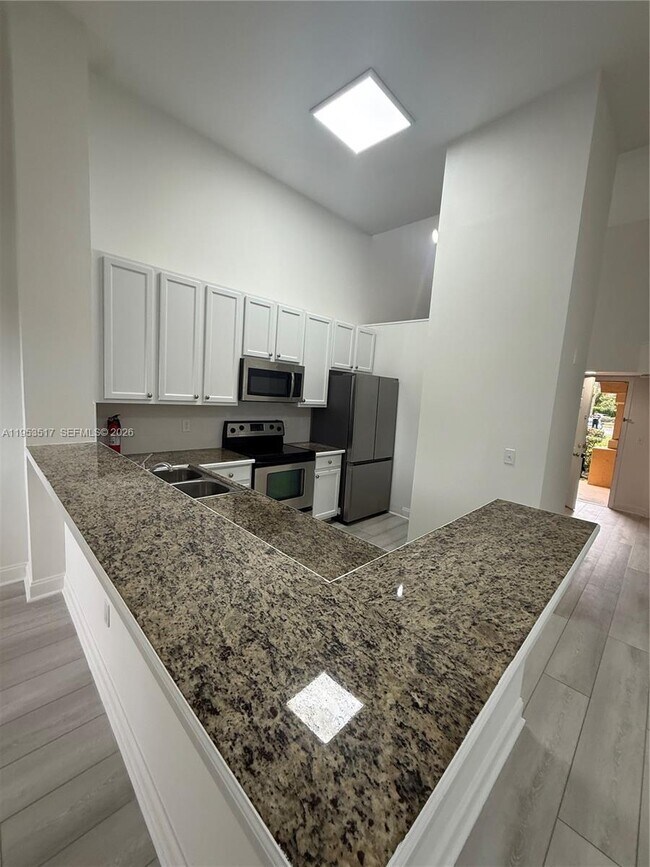 Building Photo - 4847 Via Palm Lakes