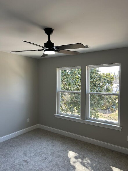 Bedroom #1: quiet, spacious, ceiling fan, beautiful windows and walk in closet - 334 Bailey St