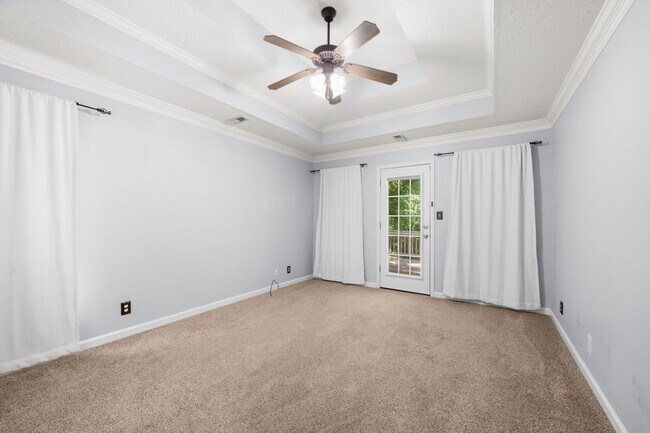 Building Photo - Stunning Stone Fireplace • Finished Basement • Fenced Yard
